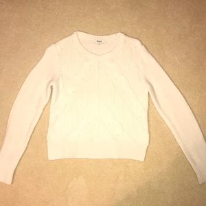 Cropped cable knit sweater